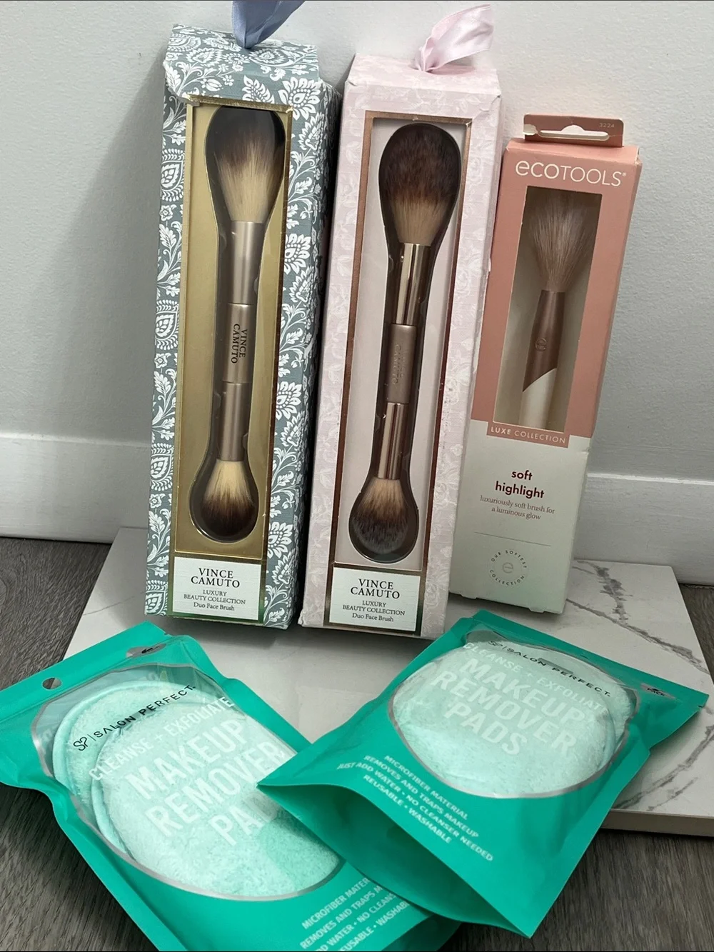 Vince Camuto makeup brushes and makeup remover pads